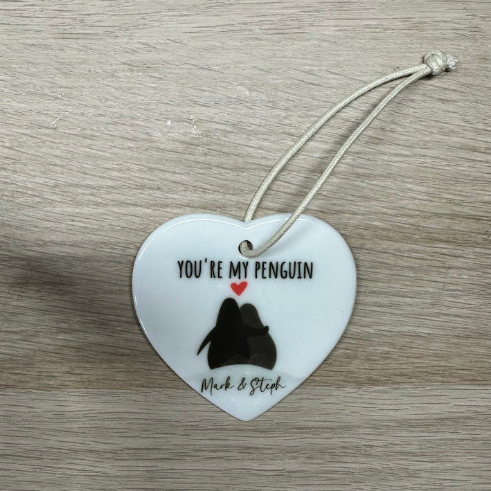 Cuddling Penguins - Personalised Ceramic Heart